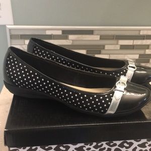 Black and white polka dot flats.